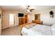 A main bedroom with a walk-in closet and en suite bathroom with a bathtub at 46122 County Road 53, Bennett, CO 80102