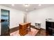 Office featuring polished concrete floors, recessed lighting, and a wooden desk at 46122 County Road 53, Bennett, CO 80102