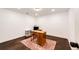 Office featuring carpet floors, recessed lighting, and a wooden desk at 46122 County Road 53, Bennett, CO 80102