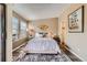 Serene bedroom with lots of natural light, wood flooring, and stylish decor at 4285 S Salida Way # 17, Aurora, CO 80013