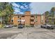 Charming multi-story condo complex featuring balconies and a parking lot at 4285 S Salida Way # 17, Aurora, CO 80013