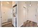 Convenient laundry area with a stacked washer and dryer located in the hallway at 4285 S Salida Way # 17, Aurora, CO 80013