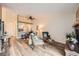 Inviting living room with dining area, featuring stylish furnishings and wood flooring at 4285 S Salida Way # 17, Aurora, CO 80013