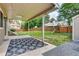 Covered back patio overlooking a spacious fenced yard with a playset at 3973 S Joplin Way, Aurora, CO 80013