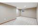Spacious basement with neutral carpet and paint at 3973 S Joplin Way, Aurora, CO 80013