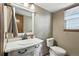 Charming bathroom with vanity, stylish mirror and toilet at 3973 S Joplin Way, Aurora, CO 80013