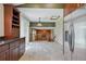 Spacious kitchen featuring an open layout with views into the living room at 3973 S Joplin Way, Aurora, CO 80013