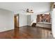 Bright living room with hardwood floors and view into kitchen at 3973 S Joplin Way, Aurora, CO 80013