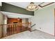 Living room with a brick fireplace and hardwood floors at 3973 S Joplin Way, Aurora, CO 80013