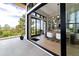 Indoor outdoor dining area features large windows with scenic views of the landscape at 922 W Wolfensberger Rd, Castle Rock, CO 80109