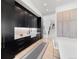 Stylish kitchen features dark cabinets, white countertops, and modern appliances at 922 W Wolfensberger Rd, Castle Rock, CO 80109