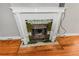 Classic fireplace with green tile and ornate mantel at 1317 S University Blvd, Denver, CO 80210