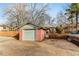 Detached garage with a single car door at 1317 S University Blvd, Denver, CO 80210