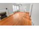 Living room with hardwood floors and fireplace at 1317 S University Blvd, Denver, CO 80210