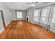 Spacious living room with hardwood floors and a fireplace at 1317 S University Blvd, Denver, CO 80210