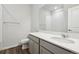 Well-lit bathroom featuring a large mirror and sleek countertop with modern fixtures at 1321 Loraine N Cir, Lafayette, CO 80026