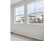 Bright windows letting natural light into the space, showcasing a view of the neighborhood at 1321 Loraine N Cir, Lafayette, CO 80026