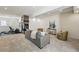Finished basement with a cozy fireplace, living area, and workout space, perfect for entertaining or relaxation at 9826 E 27Th Dr, Denver, CO 80238