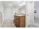 Functional bathroom featuring a single vanity, tile flooring, and a shower-tub combination at 9826 E 27Th Dr, Denver, CO 80238