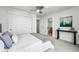 A neutral bedroom with access to an ensuite bath and large closet at 9826 E 27Th Dr, Denver, CO 80238