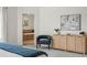 Light-filled main bedroom with en-suite bath and decorative furnishings at 9826 E 27Th Dr, Denver, CO 80238