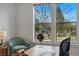 Bright office space featuring a large window with views of the community playground at 9826 E 27Th Dr, Denver, CO 80238