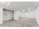 Basement features neutral carpet, closet and several windows for natural light at 4045 Navajo St, Denver, CO 80211