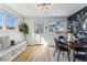 Bright dining room with natural light, modern decor, and space for a table and bench seating at 4045 Navajo St, Denver, CO 80211