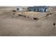 Large fenced backyard featuring a play area, a storage shed, and plenty of open space at 253 E 8Th Ave, Byers, CO 80103