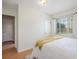 Bright bedroom featuring hardwood floors and natural light at 1454 Jersey St # 2, Denver, CO 80220