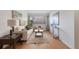 Inviting living room with hardwood floors, stylish decor, and plenty of natural light at 1454 Jersey St # 2, Denver, CO 80220