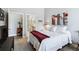 Inviting bedroom with a comfortable bed, stylish decor, and attached bathroom at 12278 Stone Timber Ct, Parker, CO 80134