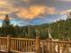 Scenic mountain view at sunset from deck at 6399 Elaine Rd, Evergreen, CO 80439