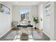 Bright office featuring contemporary desk, chair, accent rug, and abundant natural light at 4825 Basalt Ridge Cir, Castle Rock, CO 80108