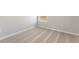 Neutral carpeted bedroom featuring a window that provides natural light at 3036 Oxley St, Strasburg, CO 80136
