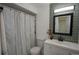 Bathroom featuring a white vanity with a shower curtain at 9390 W Alabama Dr, Lakewood, CO 80232