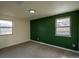 Bedroom with cozy carpet and two windows at 9390 W Alabama Dr, Lakewood, CO 80232