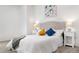 Bright bedroom with a comfortable bed, neutral decor, and ample natural light at 1055 Milo Cir # A, Lafayette, CO 80026