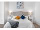 Comfortable bedroom featuring a plush bed, tufted headboard, and calming decor with modern style at 1055 Milo Cir # A, Lafayette, CO 80026