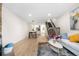 Open-concept home showcasing a kitchen, dining area and living room at 1055 Milo Cir # A, Lafayette, CO 80026
