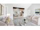 Open floor plan with living room, dining area, and kitchen with neutral colors at 381 S Ames St # E305, Lakewood, CO 80226