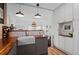 Modern kitchen with butcher block countertops, farmhouse sink, and stainless steel appliances at 1018 E 4Th Ave, Denver, CO 80218