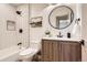 Recently renovated bathroom featuring a bathtub, tiled shower and modern vanity at 5975 S Milwaukee Way, Centennial, CO 80121