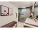Stylish bathroom with a glass-enclosed shower, patterned tile, and a modern vanity at 5975 S Milwaukee Way, Centennial, CO 80121