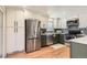 Spacious kitchen featuring stainless steel appliances, and modern cabinets at 5975 S Milwaukee Way, Centennial, CO 80121