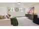 Basement living room with a sofa, modern decor, carpeted floors, and natural light at 5975 S Milwaukee Way, Centennial, CO 80121