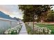 Well-maintained lawn and landscaping with flowerbeds enhance the exterior appeal at 38 Sedgwick Dr, Cherry Hills Village, CO 80113