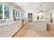 Spacious kitchen with a large island, stainless appliances, and lots of natural light at 38 Sedgwick Dr, Cherry Hills Village, CO 80113