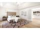 Spacious main bedroom with vaulted ceiling and large windows providing ample natural light at 38 Sedgwick Dr, Cherry Hills Village, CO 80113