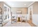 Bright sitting area with white wainscoting, features neutral tones, creating a peaceful and inviting space at 38 Sedgwick Dr, Cherry Hills Village, CO 80113